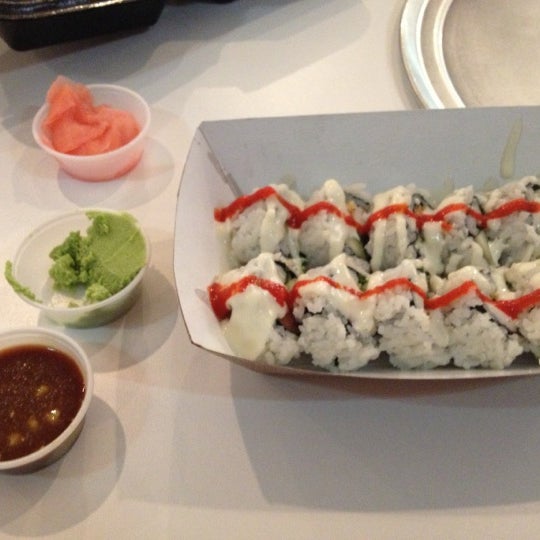 Photo taken at Rollbotto Sushi by Jeremy D. on 10/24/2012