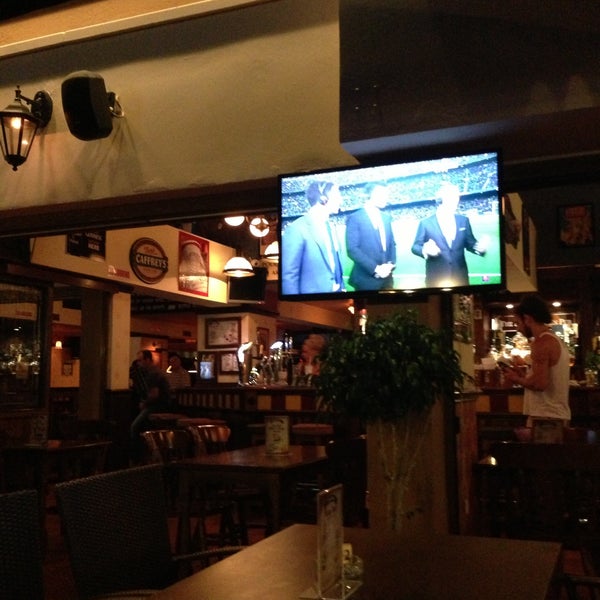 Photo taken at The New Horizon Pub (Bar &amp; Restaurant) by Ekaterina S. on 5/1/2013