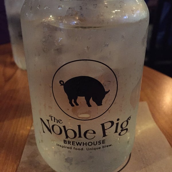 Photo taken at The Noble Pig Brewhouse &amp; Restaurant by Andrea L. on 4/29/2018