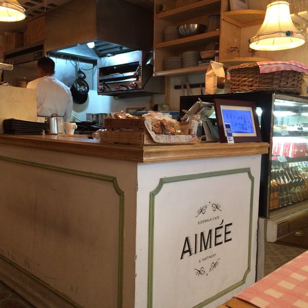 Photo taken at Aimée Sidewalk Cafe &amp; Tartinery by Paulina F. on 10/20/2016