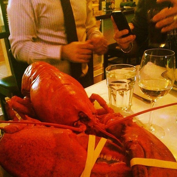 Photo taken at City Lobster &amp; Steak by William H. on 12/31/2012