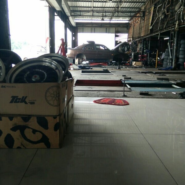 Jam Tyre & Battery Service Automotive Repair Shop