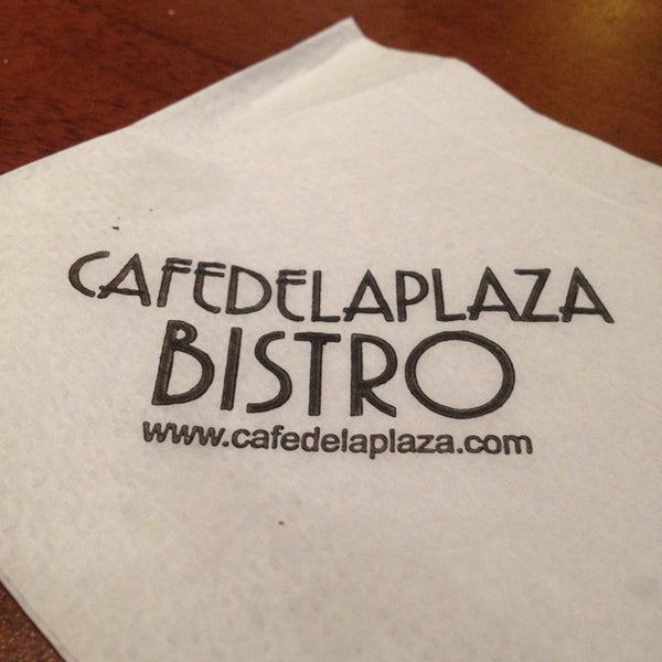 Photo taken at Café de la Plaza Bistro by Jenny M. on 6/13/2014