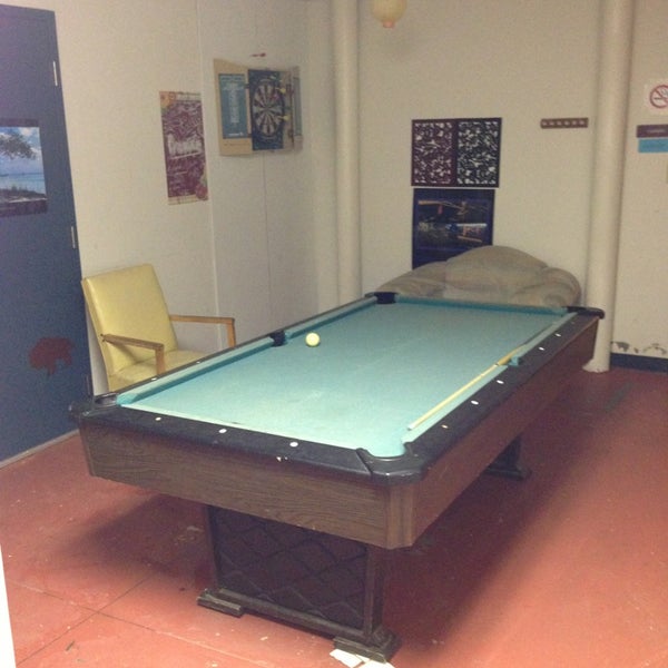 There is a pool table! Sadly the pool stick is missing the tip and the table has a slight dip to it.