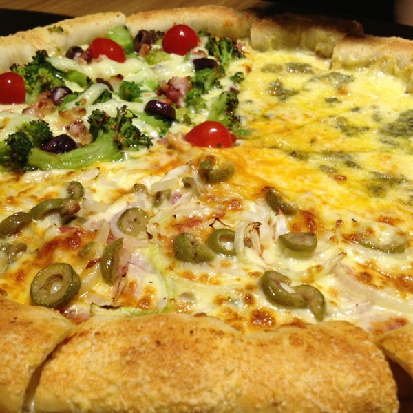 1/3/2013 tarihinde Ivolnei L.ziyaretçi tarafından Pizza Bis'de çekilen fotoğraf