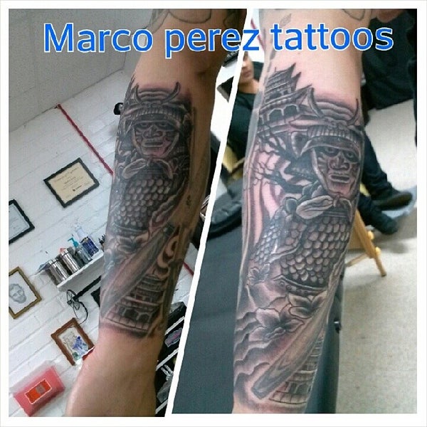 Photo taken at tattoo zone by Marco P. on 2/6/2014