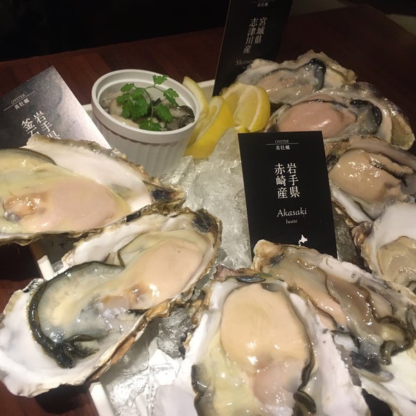 Photo taken at THE CAVE DE OYSTER TOKYO by Narumi N. on 7/28/2020