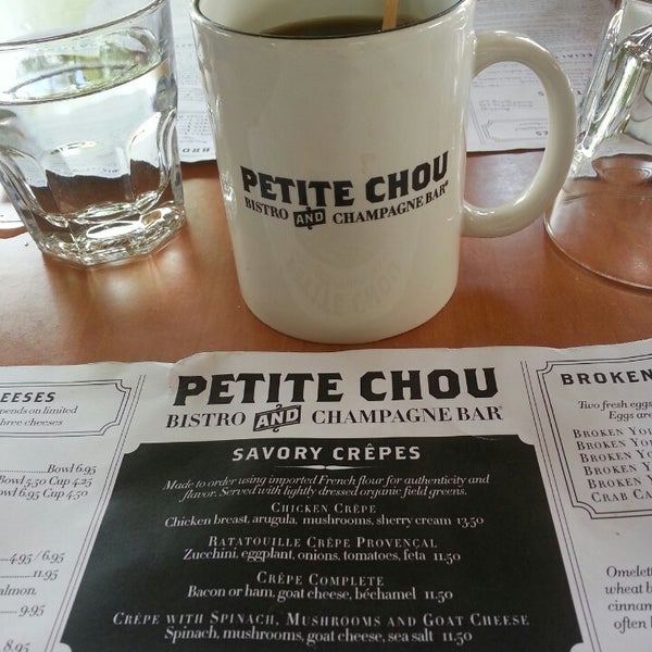 Photo taken at Petite Chou Bistro and Champagne Bar by Bethany D. on 6/10/2013