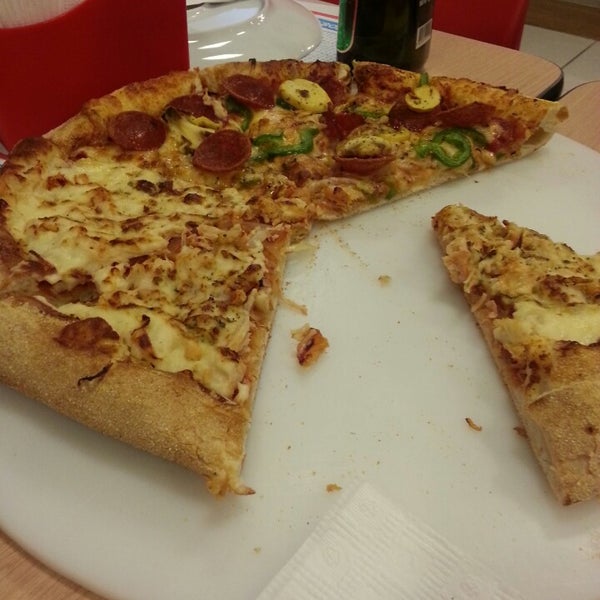 Photo taken at Domino&#39;s Pizza by Manuela D. on 4/12/2014