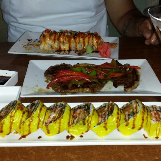 Photo taken at Manu&#39;s Tapas Bar &amp; Sushi Lounge by Claudia M. on 7/6/2013