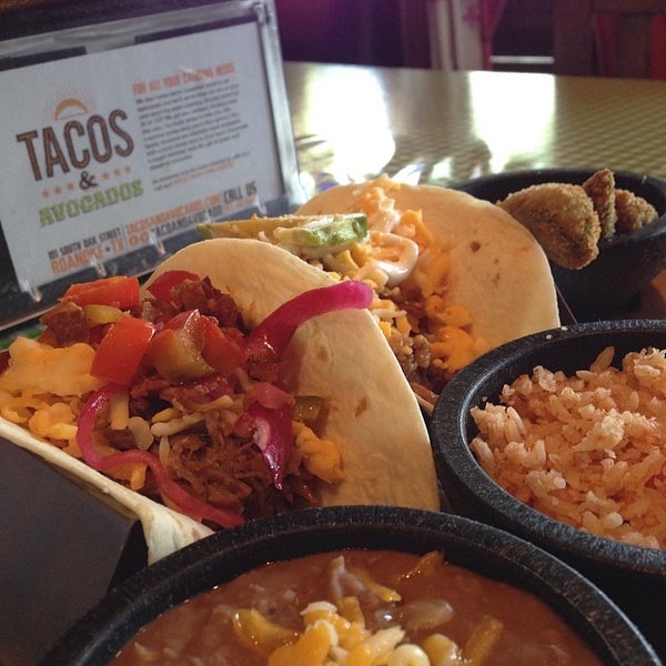 Photo taken at Tacos &amp; Avocados by Sean M. on 4/28/2014