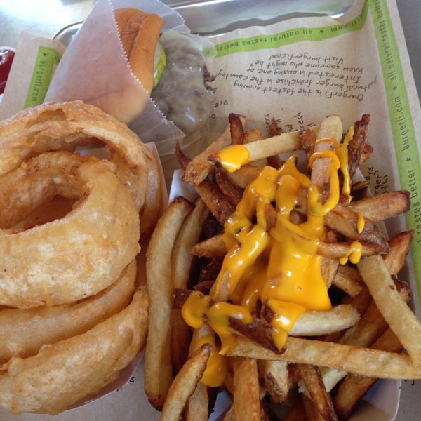 Photo taken at BurgerFi by Kendall P. on 9/26/2013