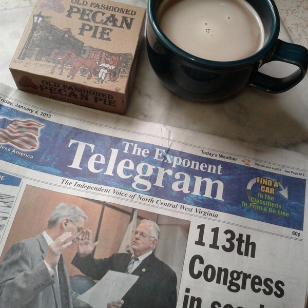 Enjoying my coffee, pecan pie and today's paper!