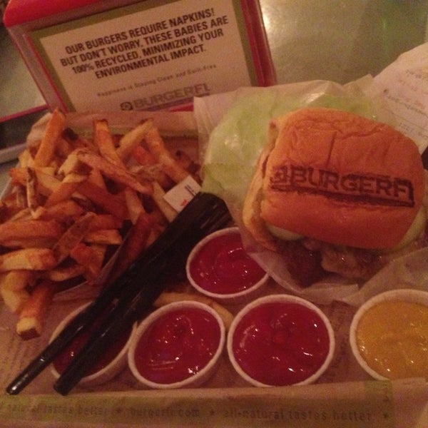 Photo taken at BurgerFi by J.R. on 8/9/2014