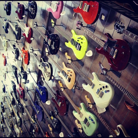 Photo taken at Cosmo Music - The Musical Instrument Superstore! by Christopher B. on 9/17/2012