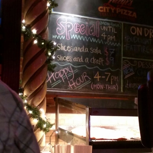 Photo taken at Luigi&#39;s City Pizza by Froilan B. on 1/1/2015