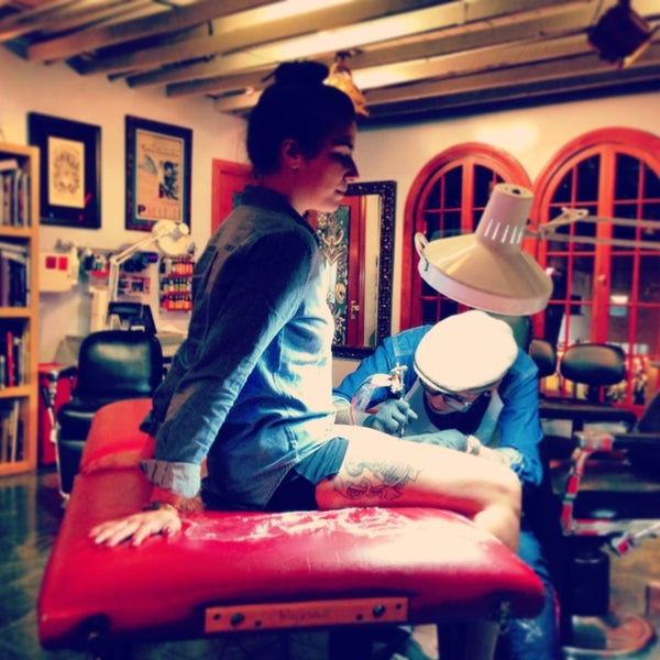 Photo taken at Body Electric Tattoo by Kate 💎 K. on 1/10/2013