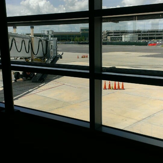 Photo taken at Louis Armstrong New Orleans International Airport (MSY) by Antonis V. on 6/27/2013