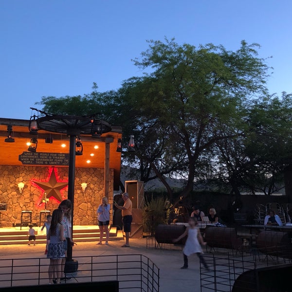 Western themed large restaurant offers a large outdoor area for dining. Live music, fire pits, s’mores, big dance floor. Note you order at the counter and pick up your food & drinks.  Fun for families