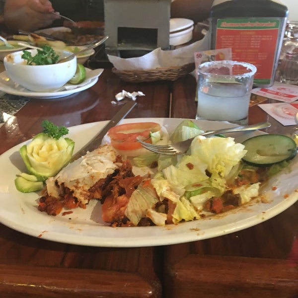 Photo taken at La Parrilla by Anabel A. on 12/12/2017