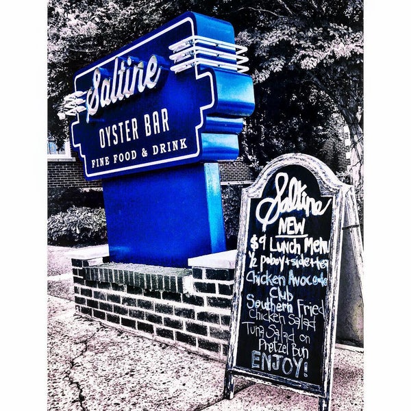 Photo taken at Saltine Restaurant by StrangeBrewCoffeehouse C. on 7/20/2015