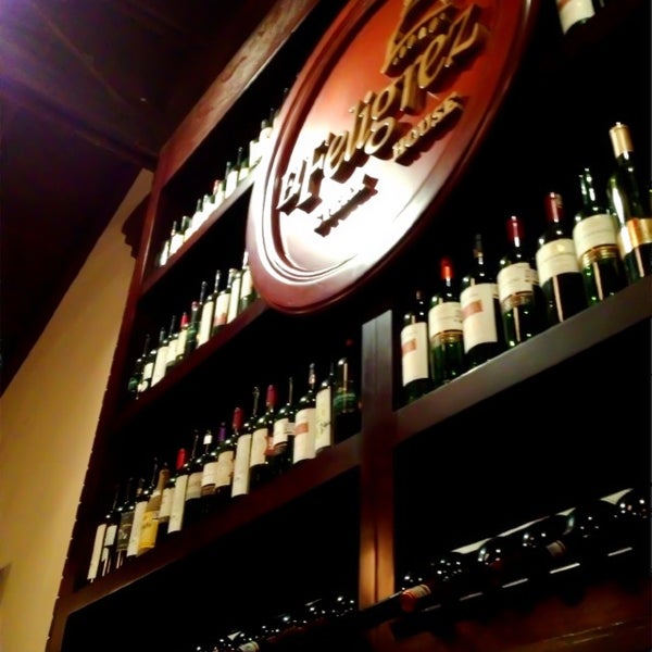 Photo taken at El Feligrez Steak House by Adriana C. on 1/26/2013