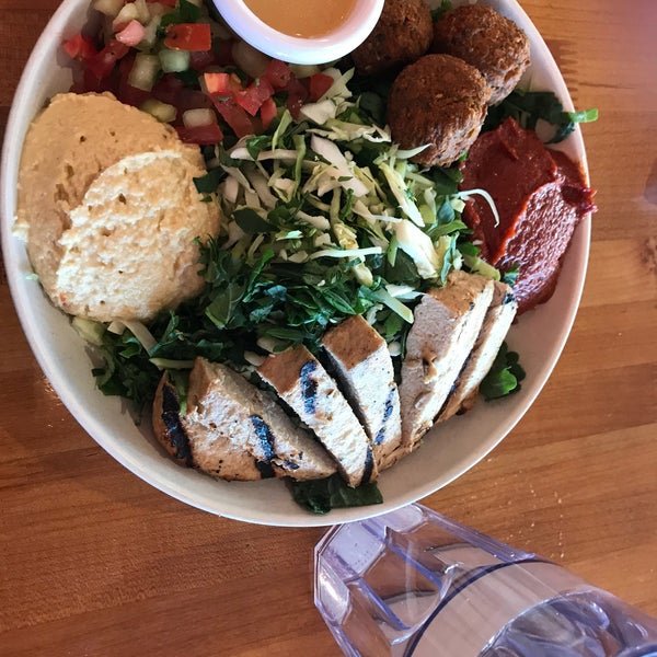 Photo taken at Veggie Grill by Lu Y. on 4/10/2018