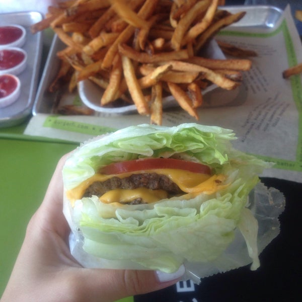 Photo taken at BurgerFi by Milla L. on 2/14/2015
