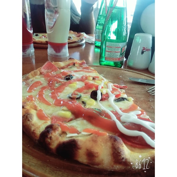 Photo taken at Pizza 7 by Dilek K. on 2/1/2018