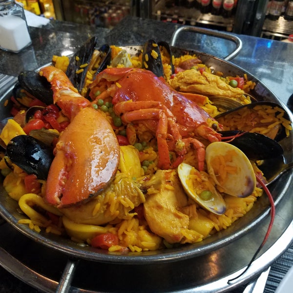 The Paella Valenciana is incredible. One is enough for 2 people.