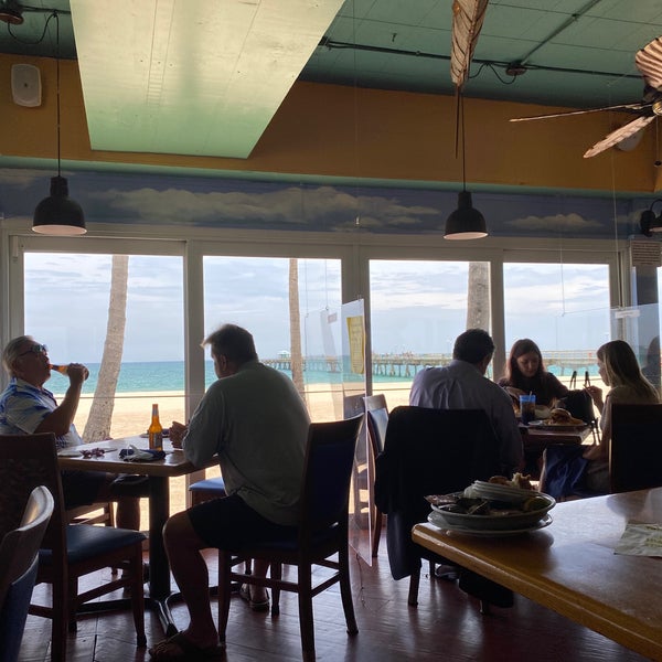 Photo taken at Aruba Beach Cafe by Scott M. on 7/5/2020