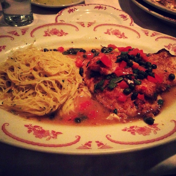 Photo taken at Maggiano&#39;s Little Italy by Temi O. on 5/9/2013