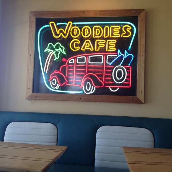 Photo taken at Woodies Café by Julie B. on 6/28/2014
