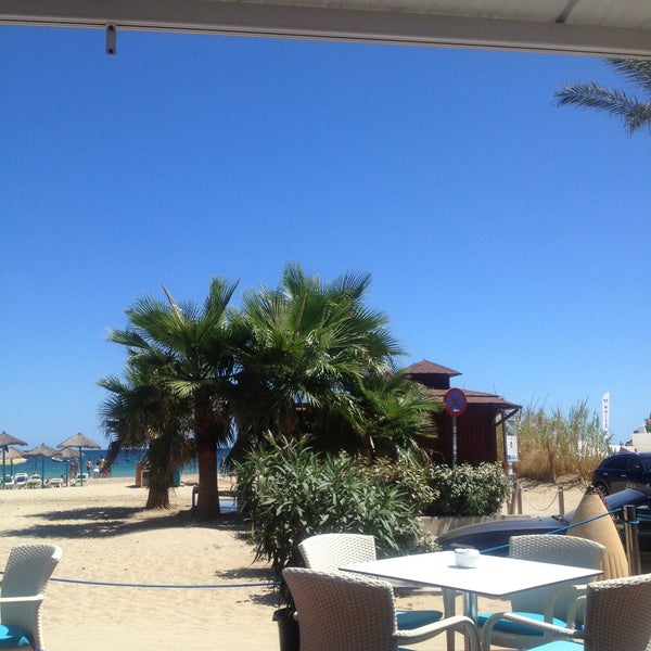 Foto diambil di St.Tropez Beach Bar &amp; Restaurant IBIZA oleh Alisa S. pada 7/29/2013