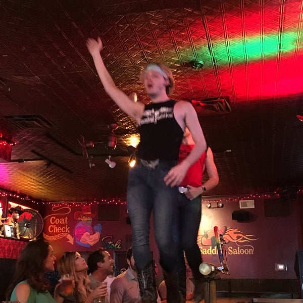 Photo taken at Flaming Saddles Saloon by Andrea M. on 5/19/2019