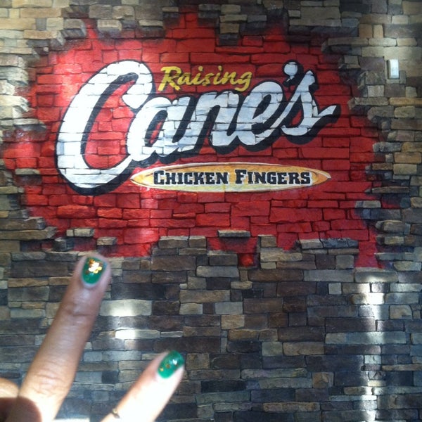 Photo taken at Raising Cane&#39;s Chicken Fingers by Tiffany B. on 12/26/2013