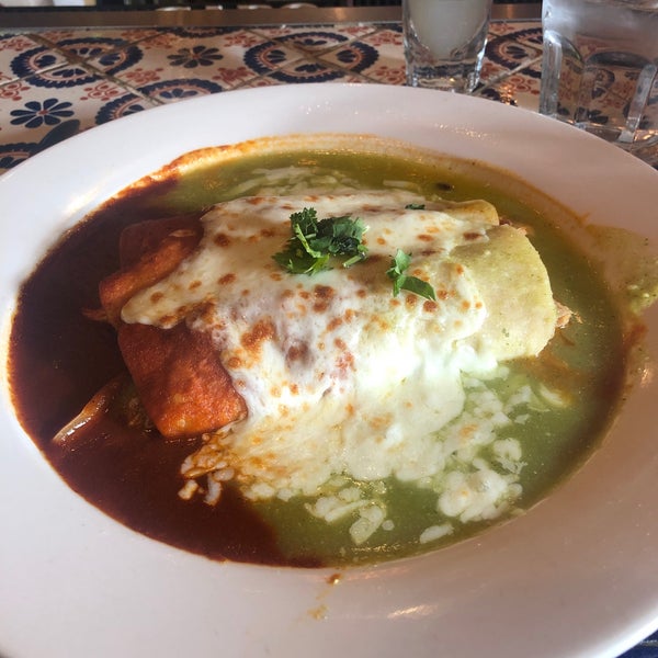 Photo taken at Mole Restaurante Mexicano &amp; Tequileria by Meg D. on 12/31/2019