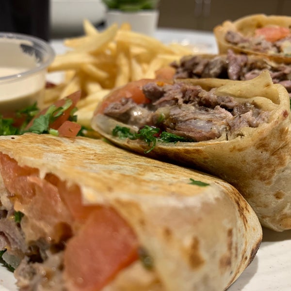 Photo taken at Simsim Outstanding Shawarma by Phelan R. on 1/17/2019