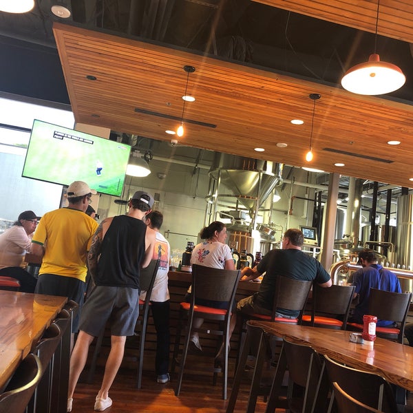 Photo taken at AquaBrew by Michelle W. on 6/29/2018