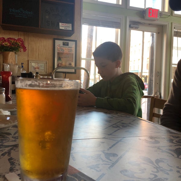 Photo taken at Shark Shack Beach Bar &amp; Grill by Michelle W. on 3/19/2019