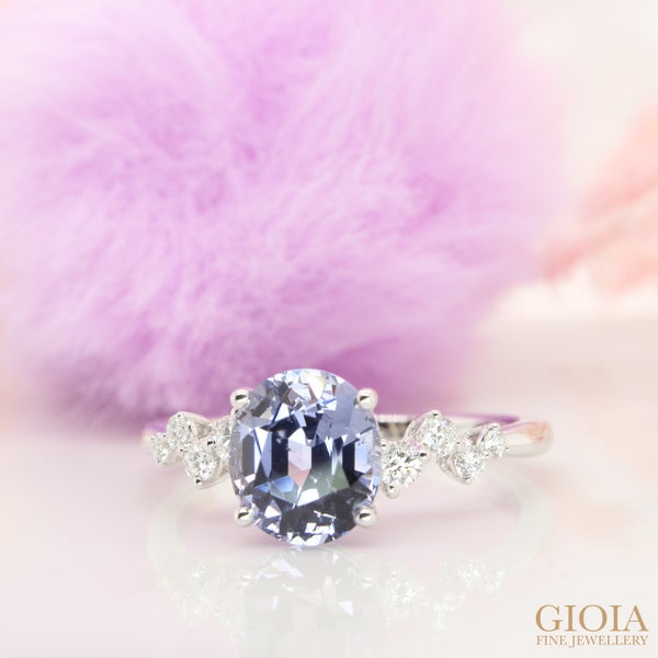 Lavender Spinel Engagement Ring Irregular movement of pave diamonds joining to the centre sweet lilac spinel, inspired by the ups and downs in all good relationship.