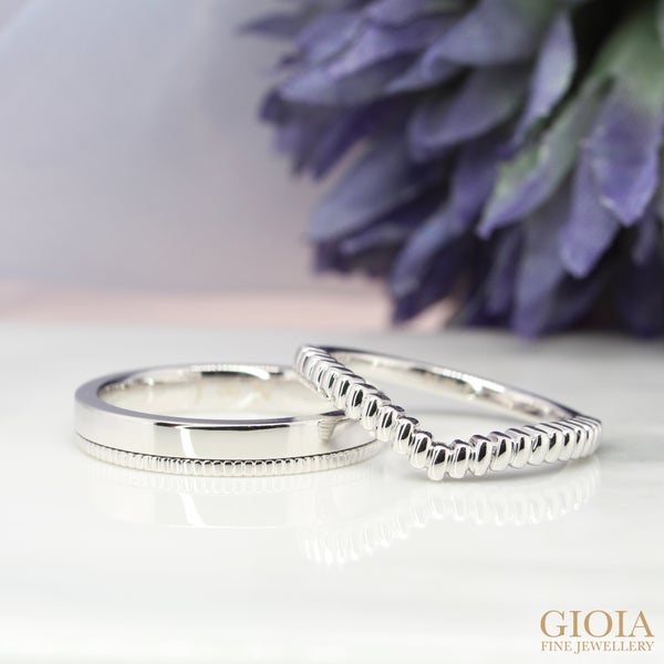 Wedding Bands Baguette Detailing The unique baguette textured adds a modern touch to this elegant pair of wedding bands.