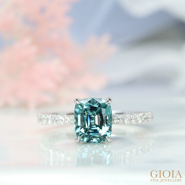Lagoon Tourmaline Engagement Ring Featuring a vibrant bluish-green lagoon tourmaline, designed with 3/4 micro-pave diamonds. Congratulation to Xin Yuan & Yan Ting!