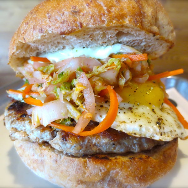 This week only! The Korean Burger: House ground bird patty, kimchee, cilantro lime aioli and an organic fried egg on a wheat bun. With choice of side and a glass of Victory Brewing “Prima” or a soda.