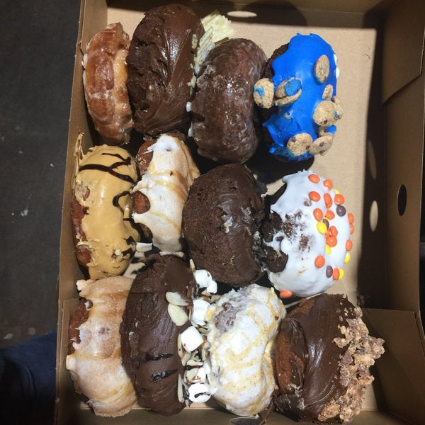 Photo taken at Holey Schmidt Donuts by Jessica R. on 3/21/2018