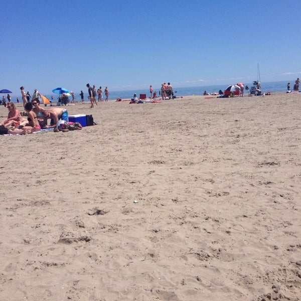 Photo taken at Cobourg Beach by Elena V. on 6/22/2014
