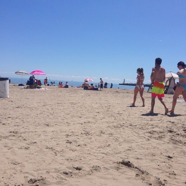 Photo taken at Cobourg Beach by Elena V. on 6/22/2014