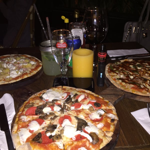 Photo taken at La Fabbrica -Pizza Bar- by Stephany Z. on 10/18/2015
