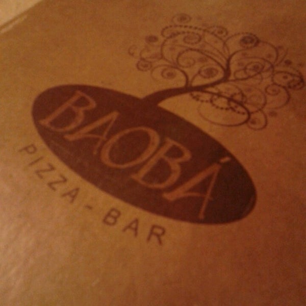 Photo taken at Baobá Pizza Bar by Fabi R. on 6/2/2014