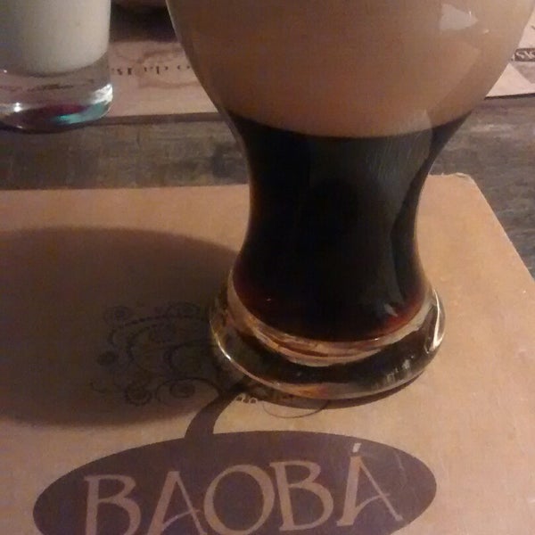 Photo taken at Baobá Pizza Bar by Fabi R. on 11/16/2014